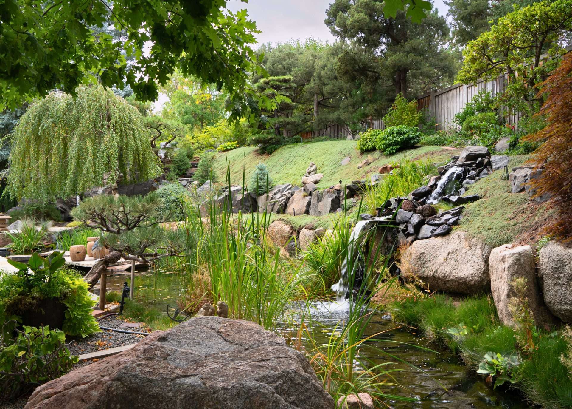 Flourish fine gardening pond and rock garden
